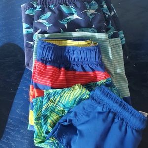 Lot of 3 boys size large swim trunks. All worn